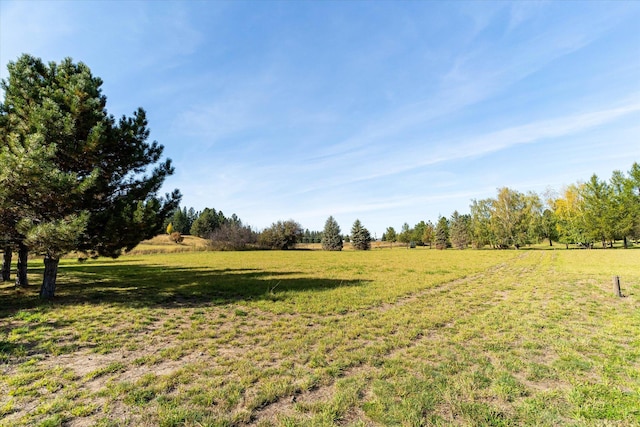 140 Swan River Rd, Bigfork, MT 59911 - view of green lawn featuring a rural view