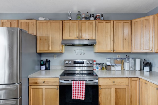 1500 Mt Highway 83, Greenough, MT 59823 - kitchen featuring stainless steel appliances, under cabinet range hood, light countertops, and light brown cabinetry