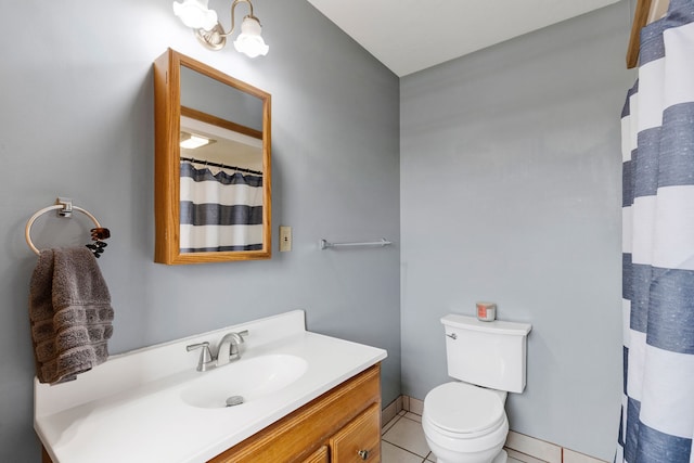 1500 Mt Highway 83, Greenough, MT 59823 - full bathroom featuring vanity, toilet, and tile patterned flooring