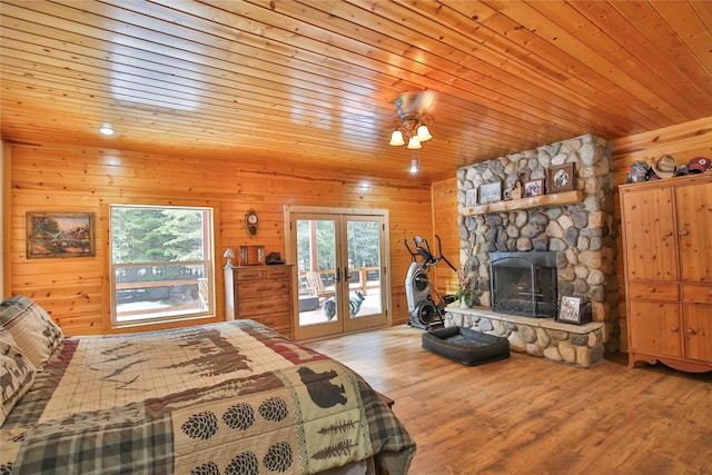 133 Klakken Rd, Noxon, MT 59853 - bedroom featuring wood finished floors, wood ceiling, access to outside, and french doors