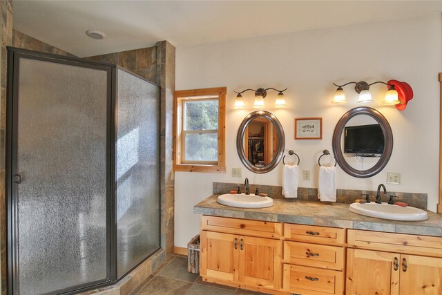 133 Klakken Rd, Noxon, MT 59853 - bathroom featuring double vanity, a shower stall, tile patterned flooring, and a sink