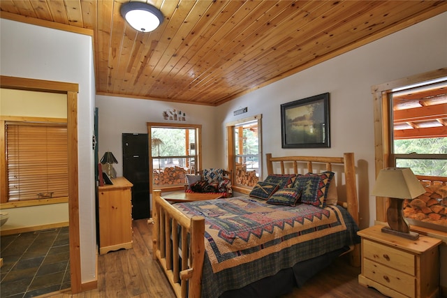 133 Klakken Rd, Noxon, MT 59853 - bedroom with wooden ceiling and dark wood-style flooring