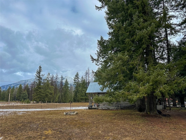 133 Klakken Rd, Noxon, MT 59853 - view of yard featuring a wooded view and a mountain view