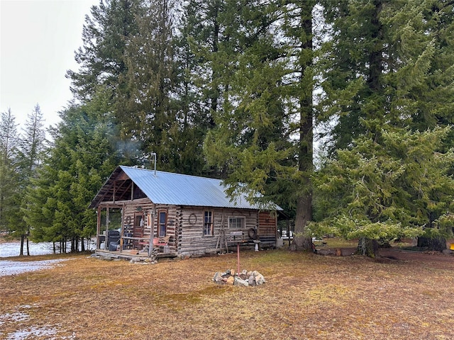 133 Klakken Rd, Noxon, MT 59853 - exterior space featuring log siding and metal roof