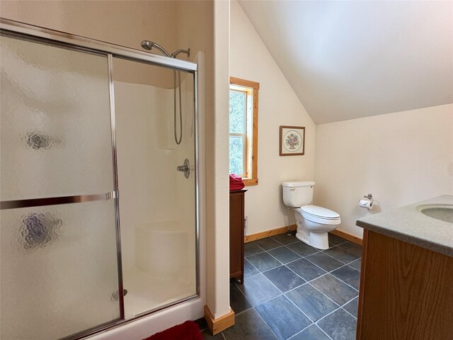 133 Klakken Rd, Noxon, MT 59853 - bathroom with vaulted ceiling, vanity, baseboards, and a stall shower