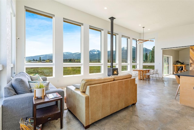 5052 Hoblitt Ln N, Florence, MT 59833 - living area with a mountain view, concrete flooring, and recessed lighting