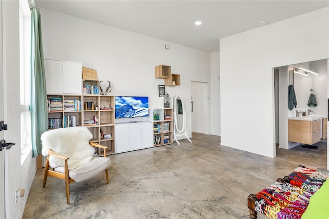 5052 Hoblitt Ln N, Florence, MT 59833 - living area featuring concrete floors