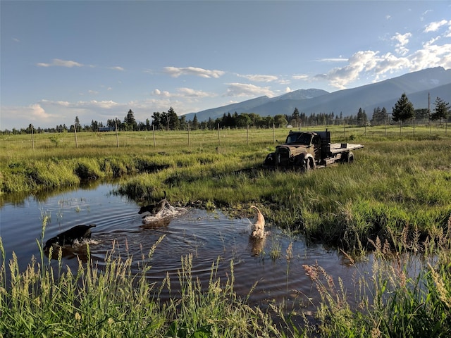 5052 Hoblitt Ln N, Florence, MT 59833 - water view with a mountainous background and rural landscape