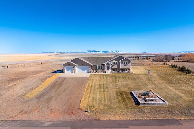 bird's eye view with a rural view and a mountain view