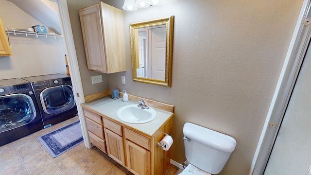 103 Alice Ave Unit B, Hamilton, MT 59840 - bathroom featuring washer and clothes dryer, vanity, and tile patterned flooring