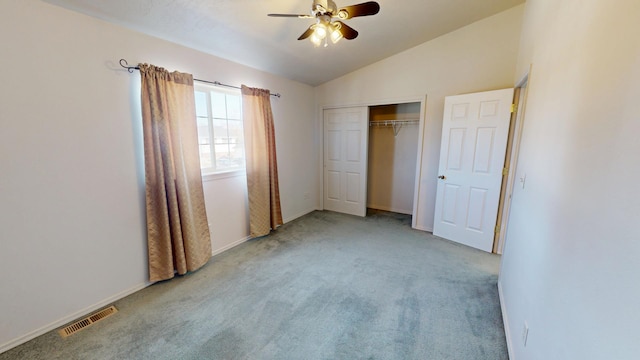 103 Alice Ave Unit B, Hamilton, MT 59840 - unfurnished bedroom featuring light carpet, lofted ceiling, a closet, and ceiling fan