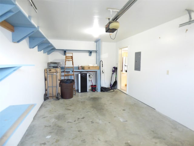 103 Alice Ave Unit B, Hamilton, MT 59840 - garage featuring electric panel and a garage door opener