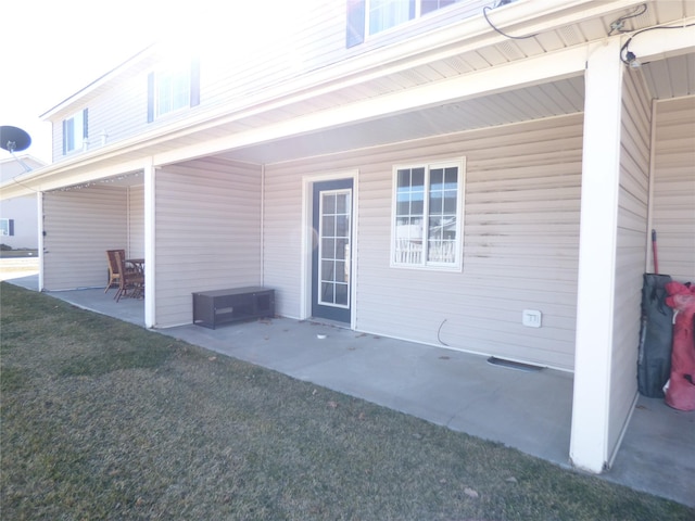 103 Alice Ave Unit B, Hamilton, MT 59840 - rear view of house with a patio and a lawn