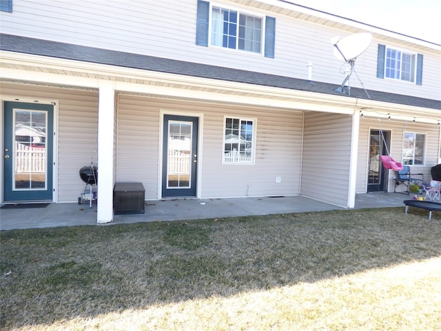 103 Alice Ave Unit B, Hamilton, MT 59840 - rear view of property with a yard and a patio