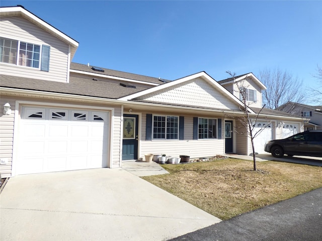 103 Alice Ave Unit B, Hamilton, MT 59840 - traditional home with concrete driveway, a front lawn, and an attached garage