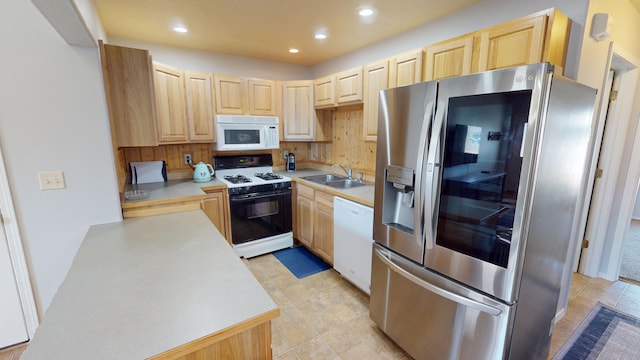 103 Alice Ave Unit B, Hamilton, MT 59840 - kitchen featuring white appliances, light brown cabinetry, light countertops, recessed lighting, and light tile patterned floors