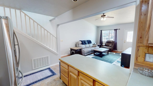 103 Alice Ave Unit B, Hamilton, MT 59840 - living room with stairway and a ceiling fan