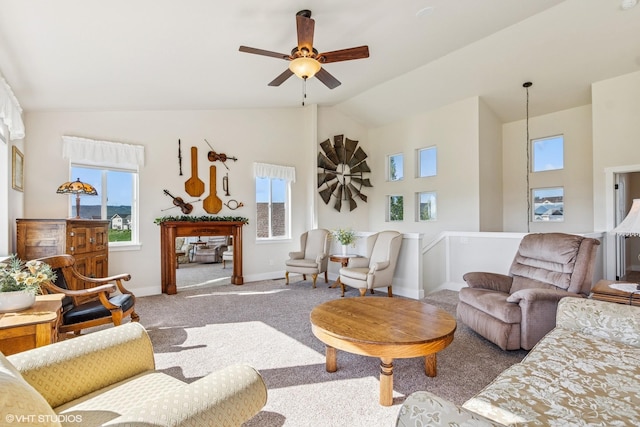 113 Mountain Vista Ct, Kalispell, MT 59901 - living area featuring high vaulted ceiling, plenty of natural light, ceiling fan, carpet flooring, and baseboards