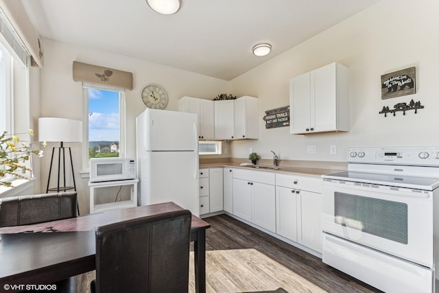 113 Mountain Vista Ct, Kalispell, MT 59901 - kitchen featuring white appliances, a sink, dark wood finished floors, white cabinetry, and light countertops