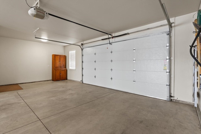 113 Mountain Vista Ct, Kalispell, MT 59901 - garage featuring a garage door opener