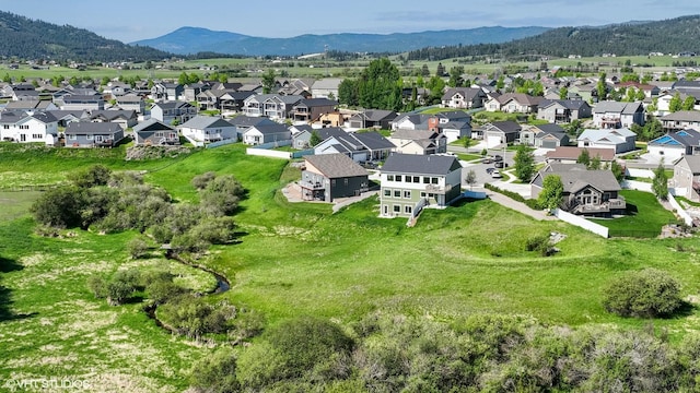 113 Mountain Vista Ct, Kalispell, MT 59901 - aerial view of property's location with a mountainous background and nearby suburban area