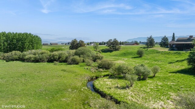 113 Mountain Vista Ct, Kalispell, MT 59901 - view of yard featuring a mountain view