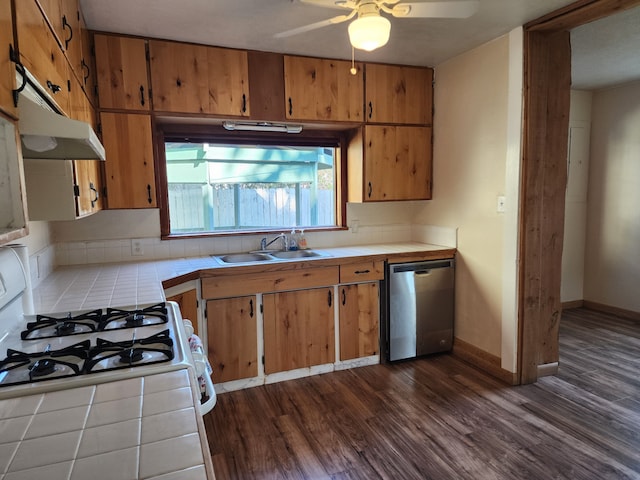 406 W 1st St W, Whitehall, MT 59759 - kitchen featuring a sink, stainless steel dishwasher, dark wood-type flooring, range, and tile countertops