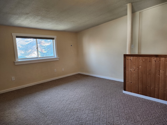 406 W 1st St W, Whitehall, MT 59759 - carpeted spare room with a textured ceiling and baseboards