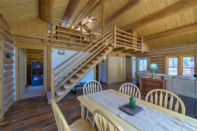 807 Pheasant Run, Hamilton, MT 59840 - dining area with rustic walls, wood-type flooring, wood ceiling with exposed beams, stairs, and high vaulted ceiling