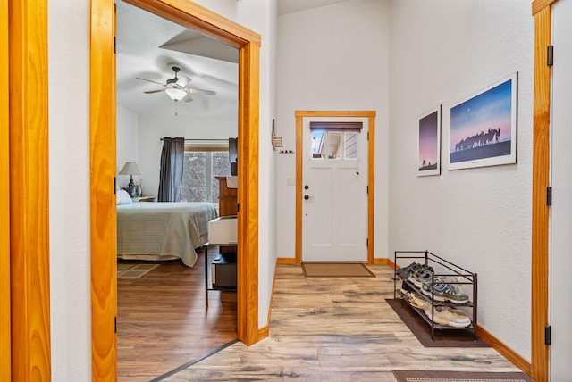 161 Oakmont Loop, Columbia Falls, MT 59912 - entryway with a ceiling fan, wood finished floors, and baseboards