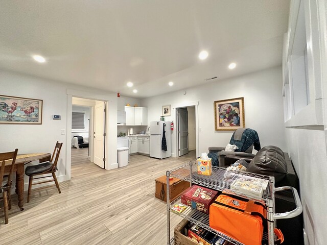 113 Mission Bay Dr, Polson, MT 59860 - living room with recessed lighting, light wood-type flooring, and baseboards