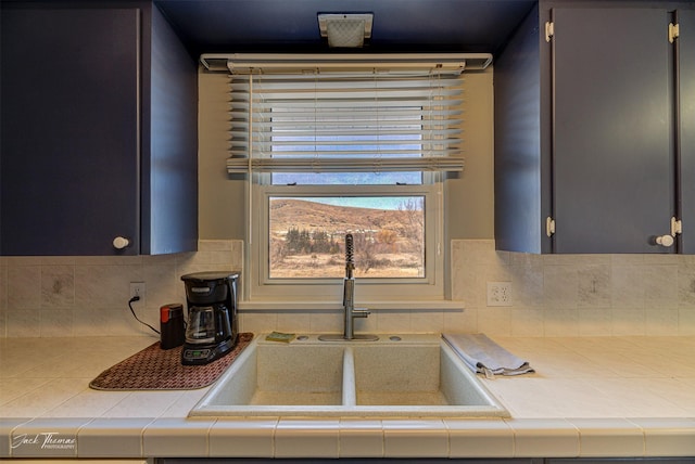 4212 W US Highway 12, Helena, MT 59601 - kitchen with tasteful backsplash and tile countertops