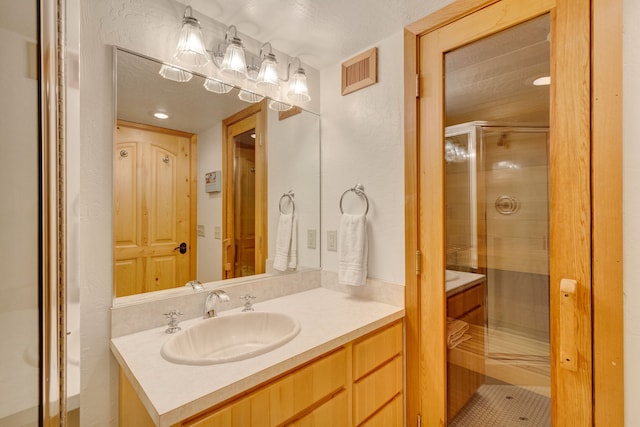 1130 Hegson Dr, Stevensville, MT 59870 - full bathroom with vanity, a stall shower, and a sauna