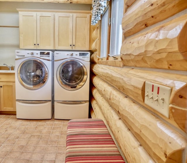 1130 Hegson Dr, Stevensville, MT 59870 - washroom featuring cabinet space and washing machine and dryer