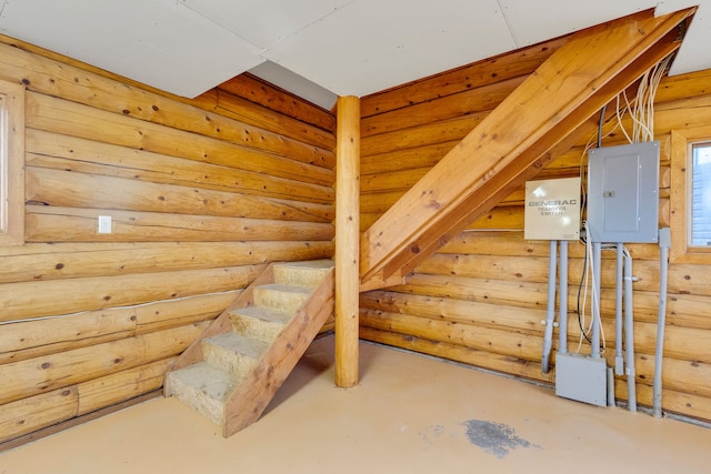 1130 Hegson Dr, Stevensville, MT 59870 - additional living space featuring electric panel, log walls, and concrete flooring