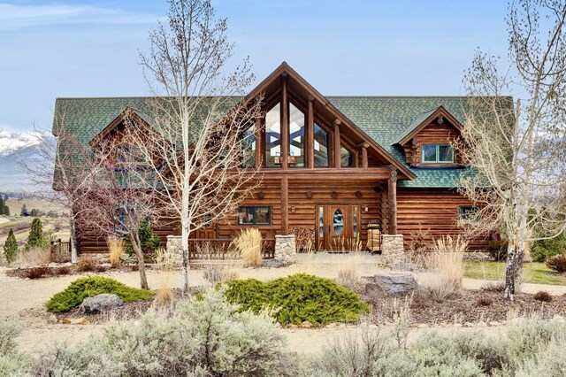 1130 Hegson Dr, Stevensville, MT 59870 - rear view of property featuring log exterior and roof with shingles