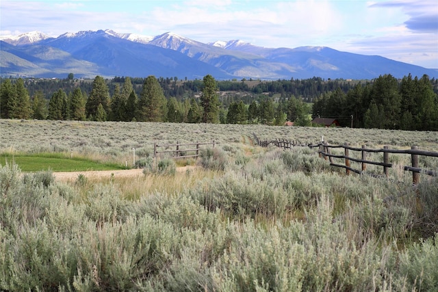 1130 Hegson Dr, Stevensville, MT 59870 - mountain view featuring a heavily wooded area and rural landscape