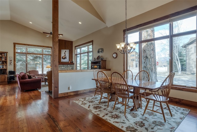 1 Rock Creek Ct, Whitefish, MT 59937 - dining room with a chandelier, hardwood / wood-style flooring, high vaulted ceiling, a ceiling fan, and recessed lighting