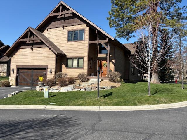 1 Rock Creek Ct, Whitefish, MT 59937 - view of front of house with a front yard and driveway