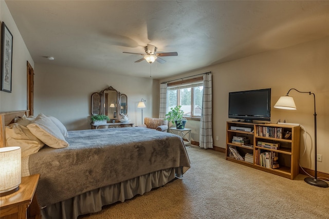 1 Rock Creek Ct, Whitefish, MT 59937 - bedroom with carpet flooring, baseboards, and ceiling fan