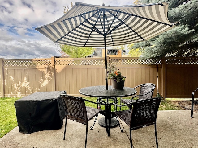 1 Rock Creek Ct, Whitefish, MT 59937 - view of patio / terrace featuring fence and outdoor dining space