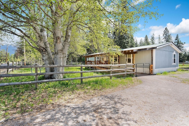 253 Aero Ln, Bigfork, MT 59911 - view of front facade featuring driveway