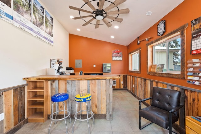 253 Aero Ln, Bigfork, MT 59911 - bar area with a ceiling fan, a wainscoted wall, recessed lighting, tile patterned flooring, and high vaulted ceiling