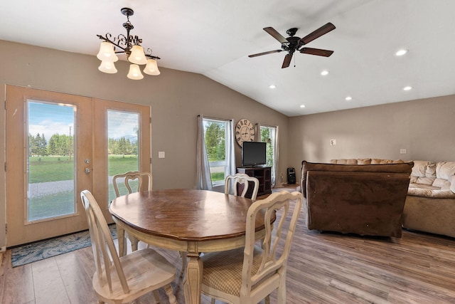 253 Aero Ln, Bigfork, MT 59911 - dining space with light wood-type flooring, french doors, lofted ceiling, recessed lighting, and a ceiling fan