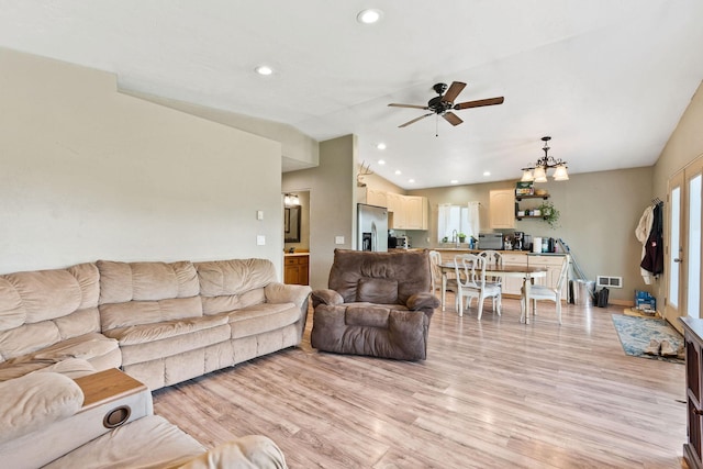 253 Aero Ln, Bigfork, MT 59911 - living area with ceiling fan, recessed lighting, light wood finished floors, and vaulted ceiling