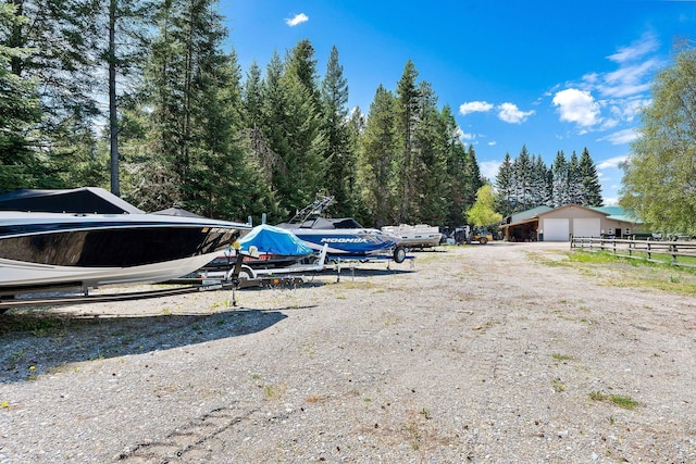 253 Aero Ln, Bigfork, MT 59911 - view of vehicle parking featuring a detached garage