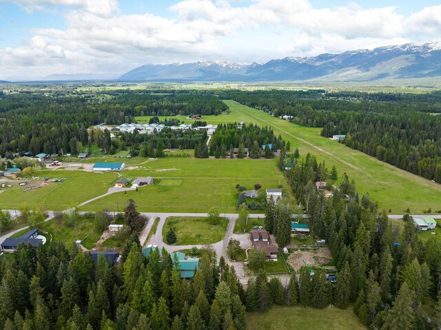 253 Aero Ln, Bigfork, MT 59911 - aerial view featuring a mountain view and a wooded view