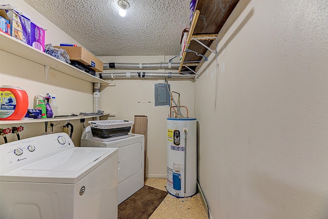 laundry room featuring water heater, washing machine and dryer, laundry area, and electric panel