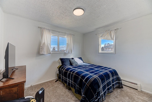 1318 Cole Ave, Helena, MT 59601 - carpeted bedroom with a baseboard radiator, a textured ceiling, and baseboards