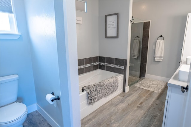 9 Ridge View Cir, Montana City, MT 59634 - full bath with a garden tub, a tile shower, wood finished floors, and vanity